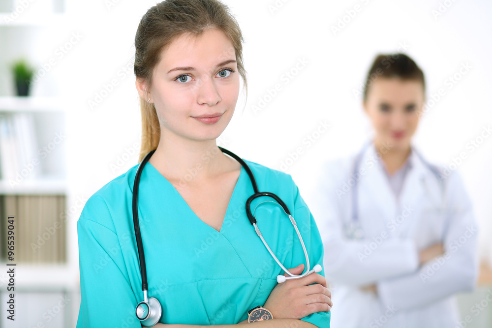Portrait of young female surgeon doctor in a hospital Portrait of young female surgeon doctor in a hospital