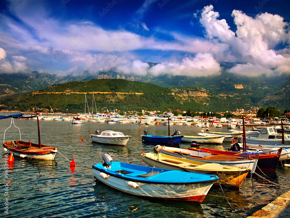 pier with boats and yachts in mountains in Montenegro