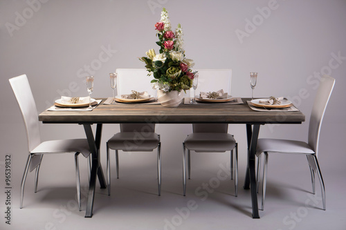Wooden table setting and decoration for meal time  studio shot