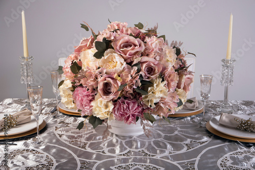 Wooden table setting and decoration for meal time, studio shot