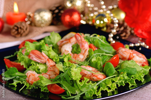 Festive shrimp salad, arugula and tomatoes