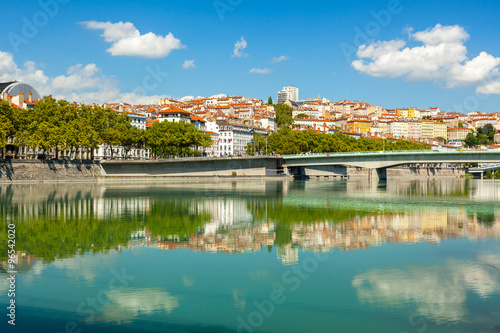 Cityscape of Lyon, France with reflections in the water