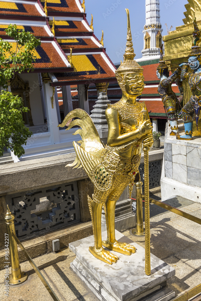Golden statue guarding temple