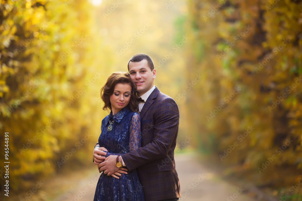 Bride and groom at wedding Day walking Outdoors on spring nature Bride and groom at wedding Day walking Outdoors on spring nature