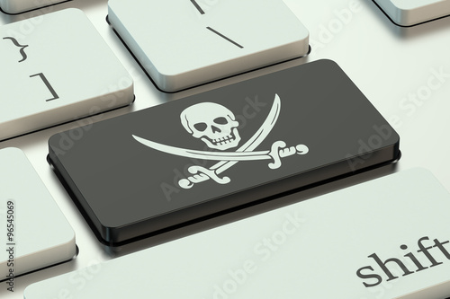 software piracy concept, on the computer keyboard photo