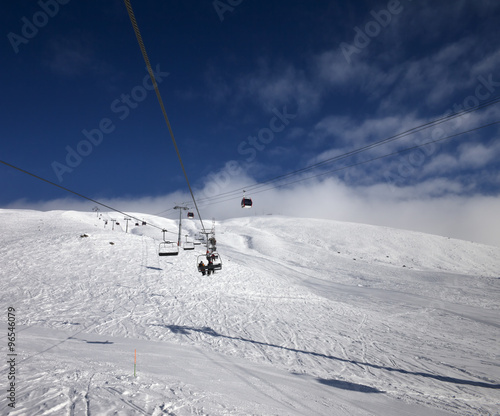 Gondola and chair lift at ski resort in nice day