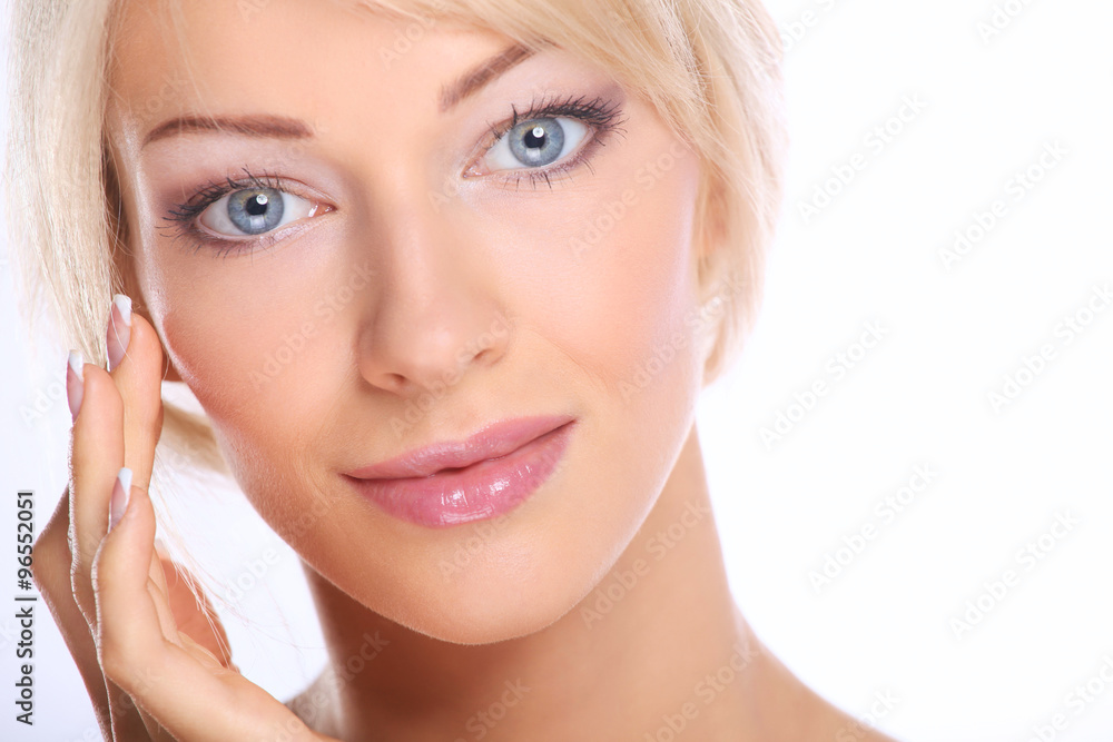 Portrait of young woman touching her face isolated on white background Portrait of young woman touching her face isolated on white background