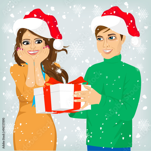 man and woman with christmas present