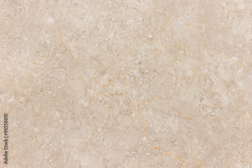 Beige marble stone wall background with natural pattern.
