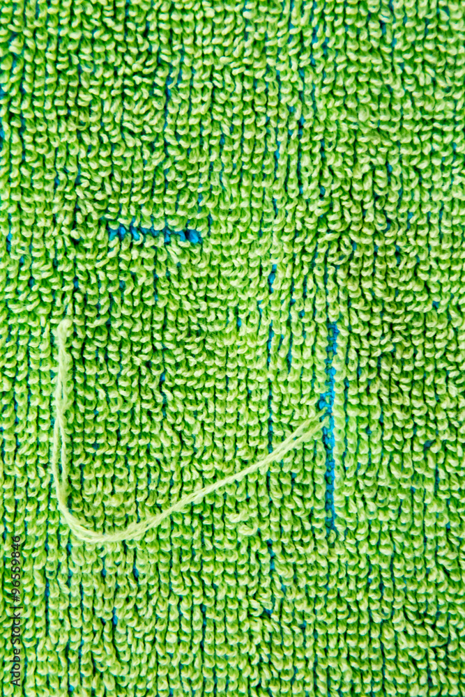 Close up of snags in a beach towel Close up of snags in a beach towel
