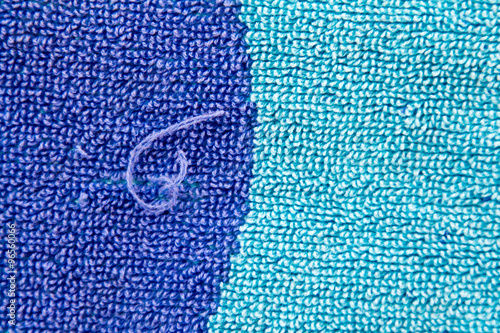 Two tone full frame beach towel with a snag