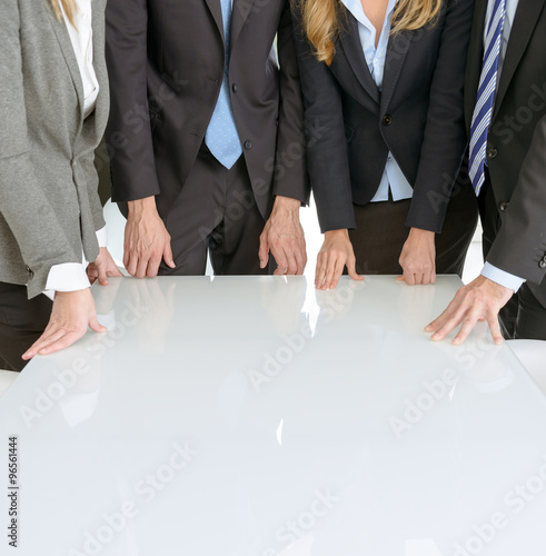 Business people around table