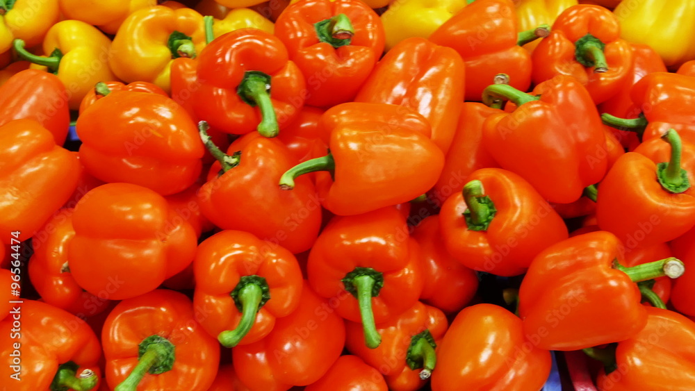 Green bell peppers with water droplets falling down in front of blurry background. Slow motion CG animation. Green bell peppers with water droplets falling down in front of blurry background. Slow motion CG animation.