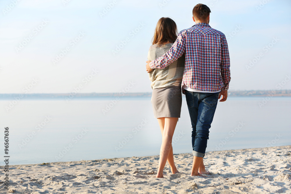 Young couple on the riverside Young couple on the riverside