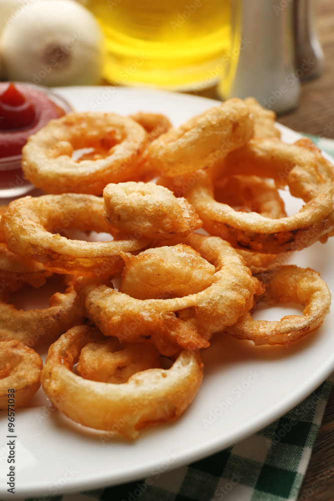 Chips rings with sauce on plate Chips rings with sauce on plate