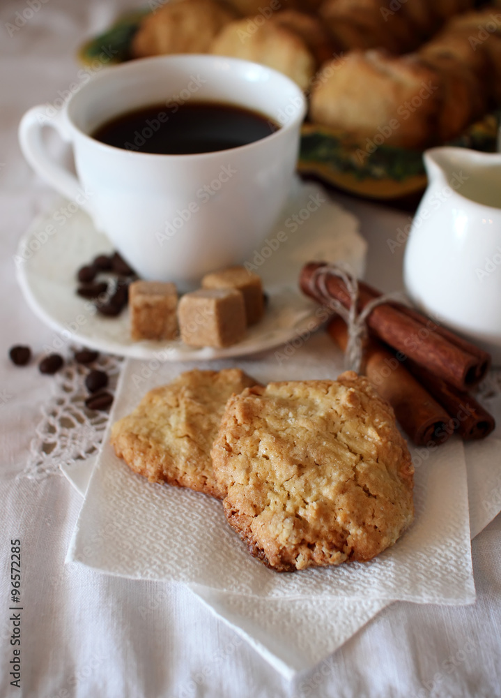 Cup of coffee and oatmeal cookies. Cup of coffee and oatmeal cookies.