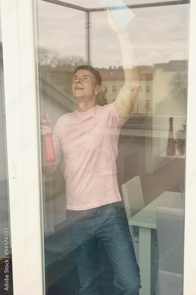 man cleaning window man cleaning window