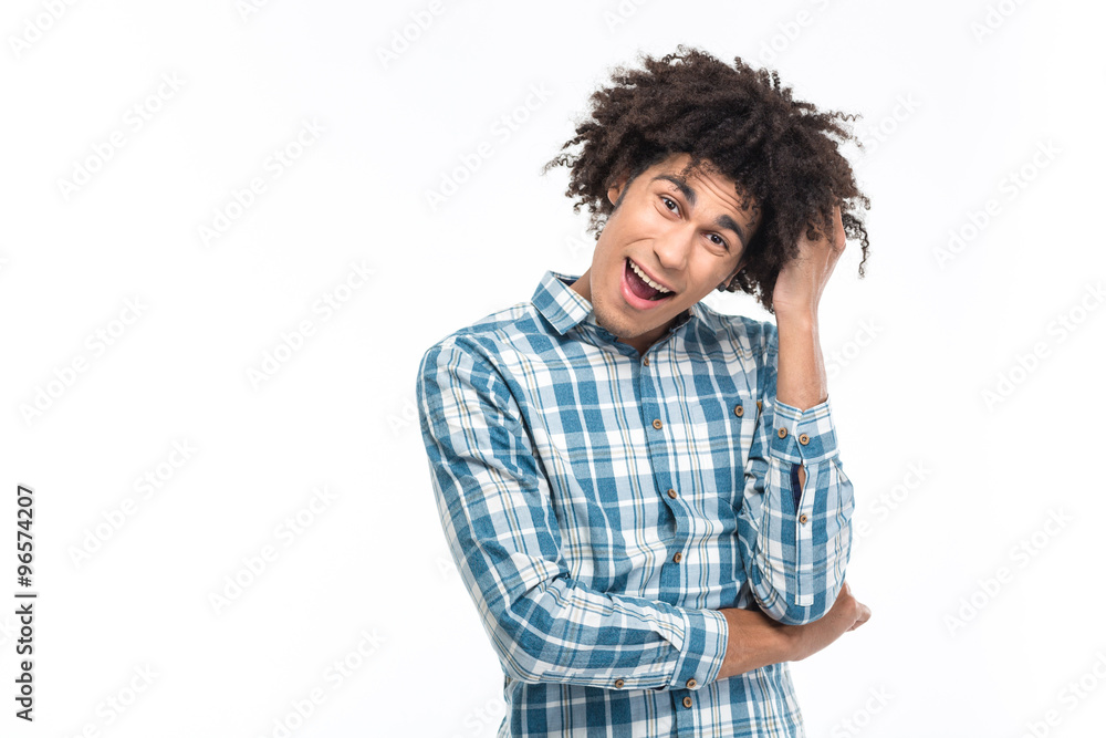 Cheerful afro american man with curly hair looking at camera Cheerful afro american man with curly hair looking at camera