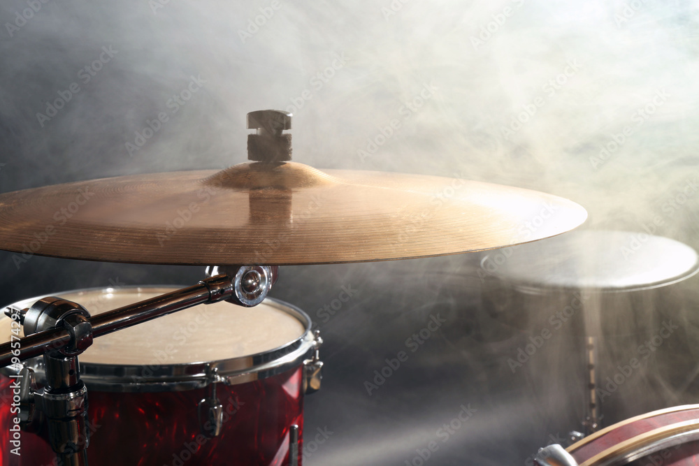 Obraz premium Drum set in smoke on a stage