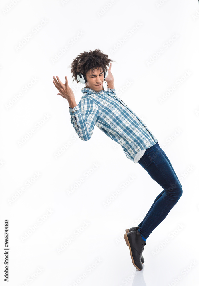 Afro american man with headphones dancing Afro american man with headphones dancing