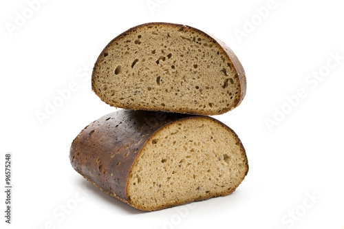 Dark rue bread on a white background.