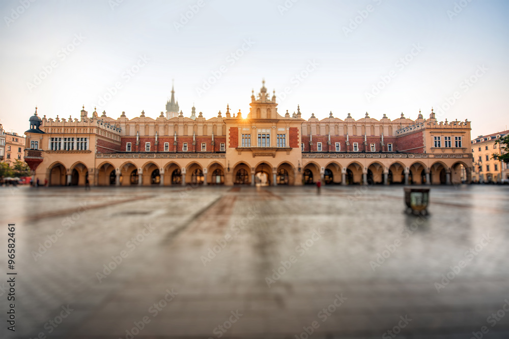 Market square with beautiful Cloth Hall in Krakow on the morning sunrise