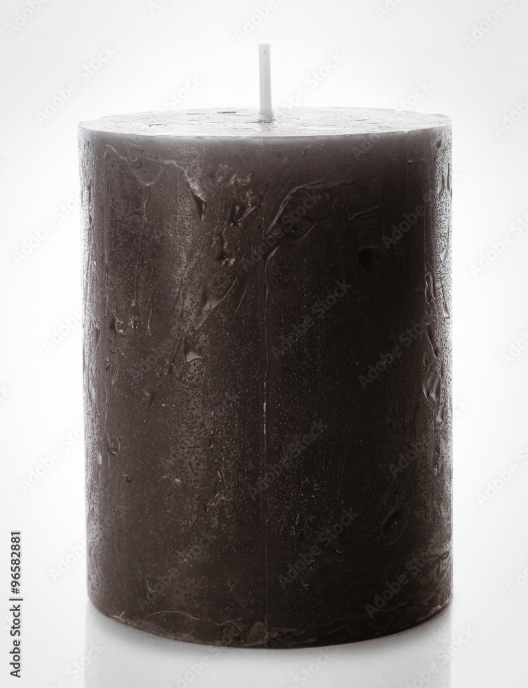 Wax grey candle isolated on white background Wax grey candle isolated on white background