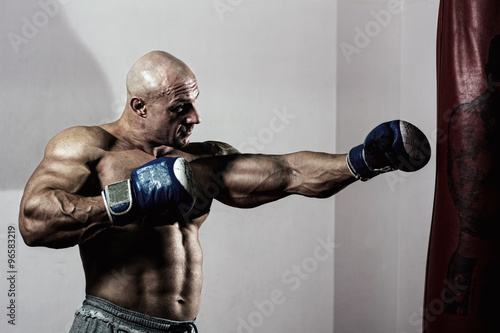Strong muscular boxer in training.