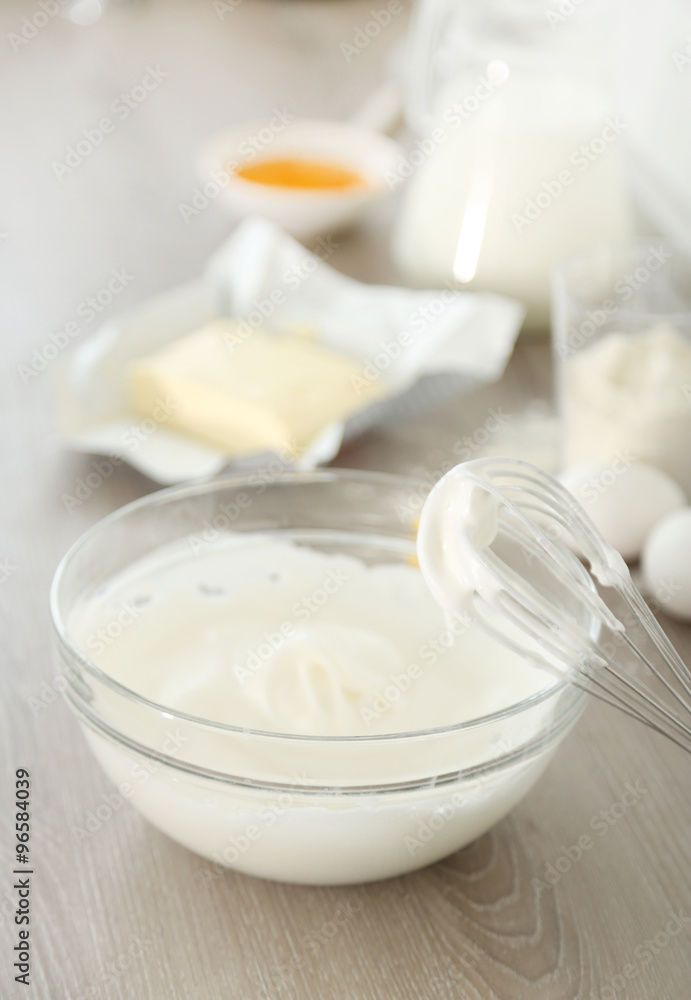 Cooking buttery cream on kitchen Cooking buttery cream on kitchen