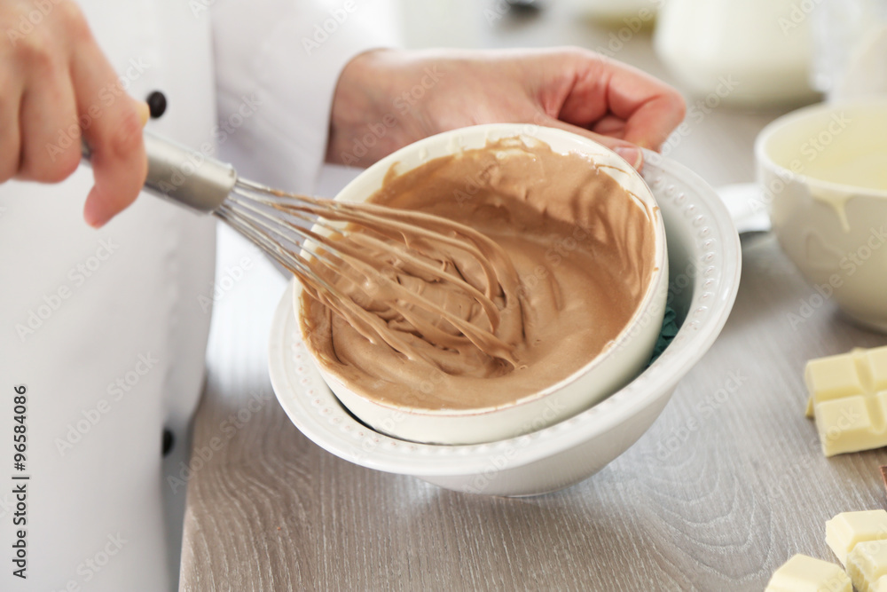 Cooking chocolate cream on kitchen Cooking chocolate cream on kitchen