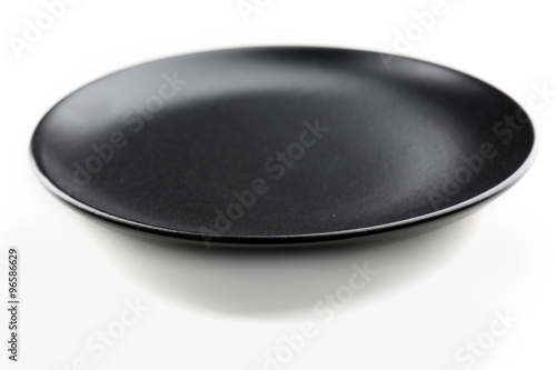 Black plate isolated on white background