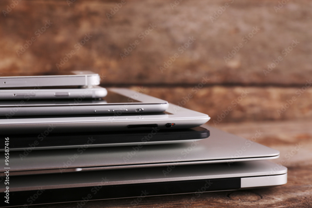 Gadgets on wooden background Gadgets on wooden background