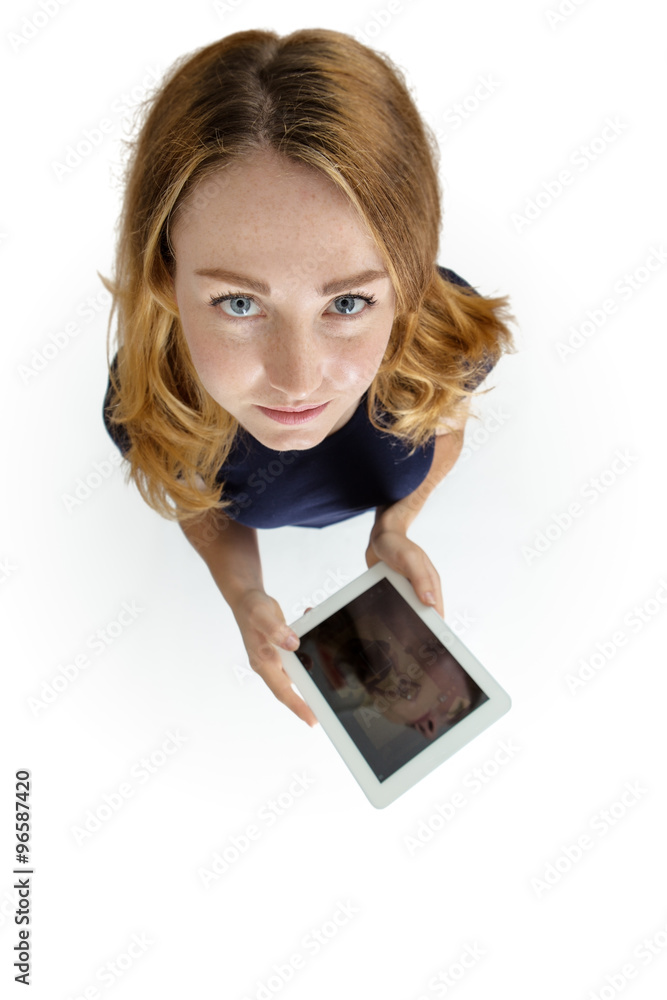 Woman using her tablet computer