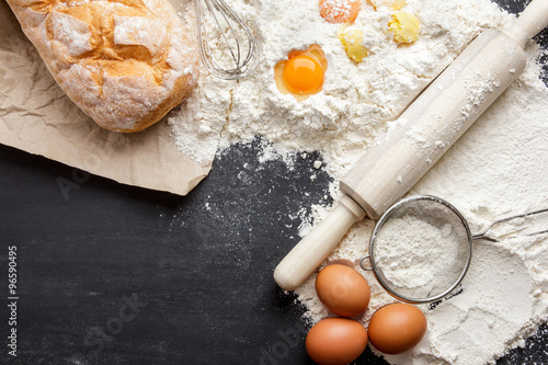 rustic bread with egg, flour, steiner and rolling pin photo