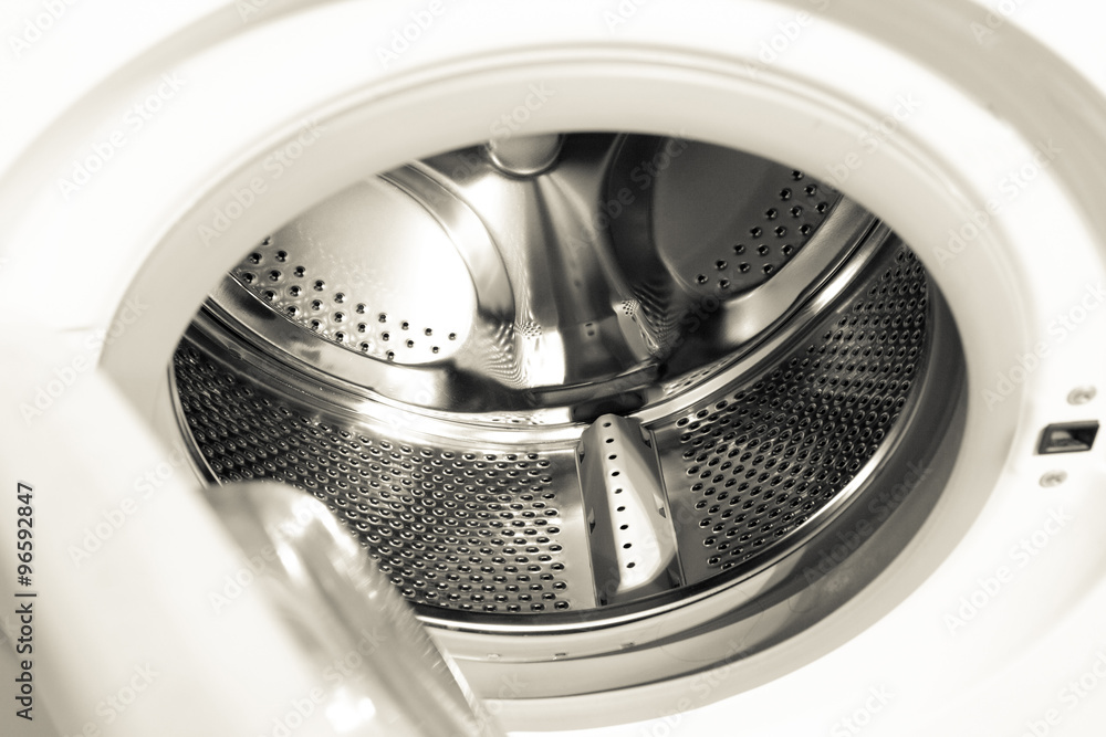 close up photo of a new washing machine close up photo of a new washing machine