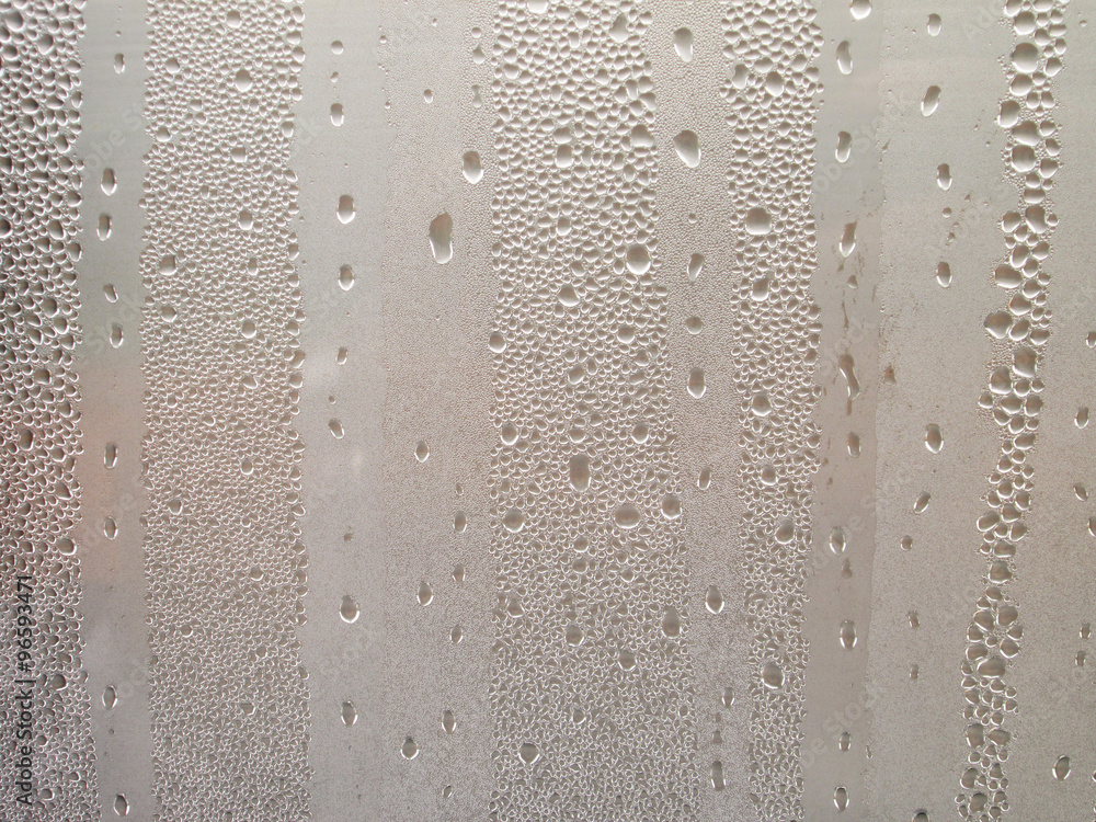 closeup Natural water drops on glass closeup Natural water drops on glass