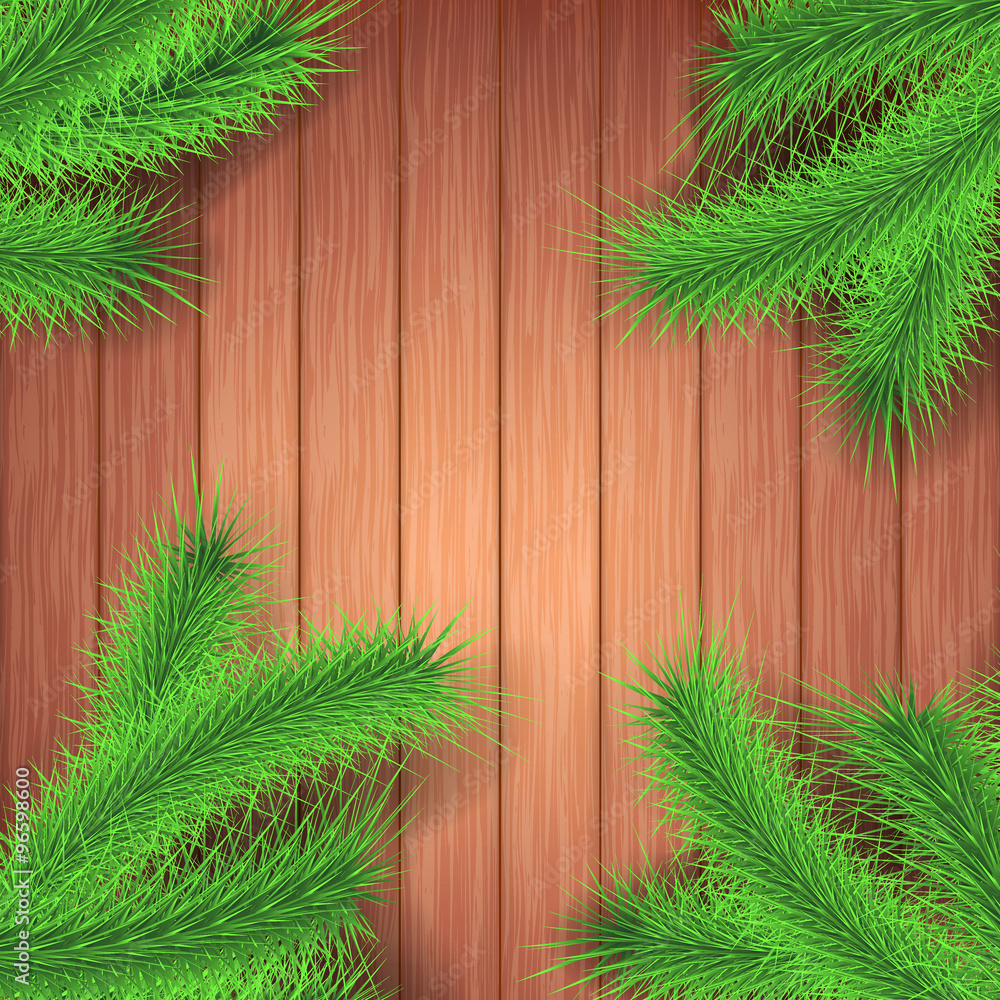 Christmas green tree branch over wooden surface Christmas green tree branch over wooden surface