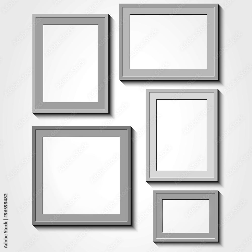 Photo Frame with shadow on a grey wall Photo Frame with shadow on a grey wall