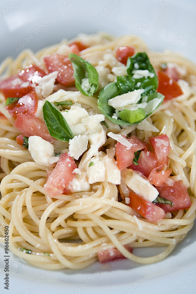 Spaghetti with tomatoes, parmesan and basil Spaghetti with tomatoes, parmesan and basil