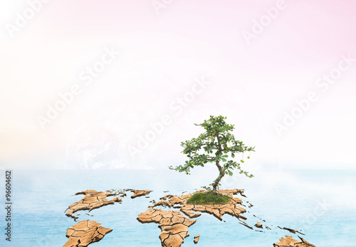 dry world map engender Moisturizing makes the green tree grow ov photo