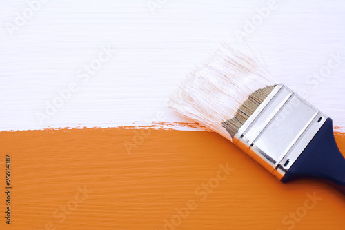 Painting orange surface with white paint