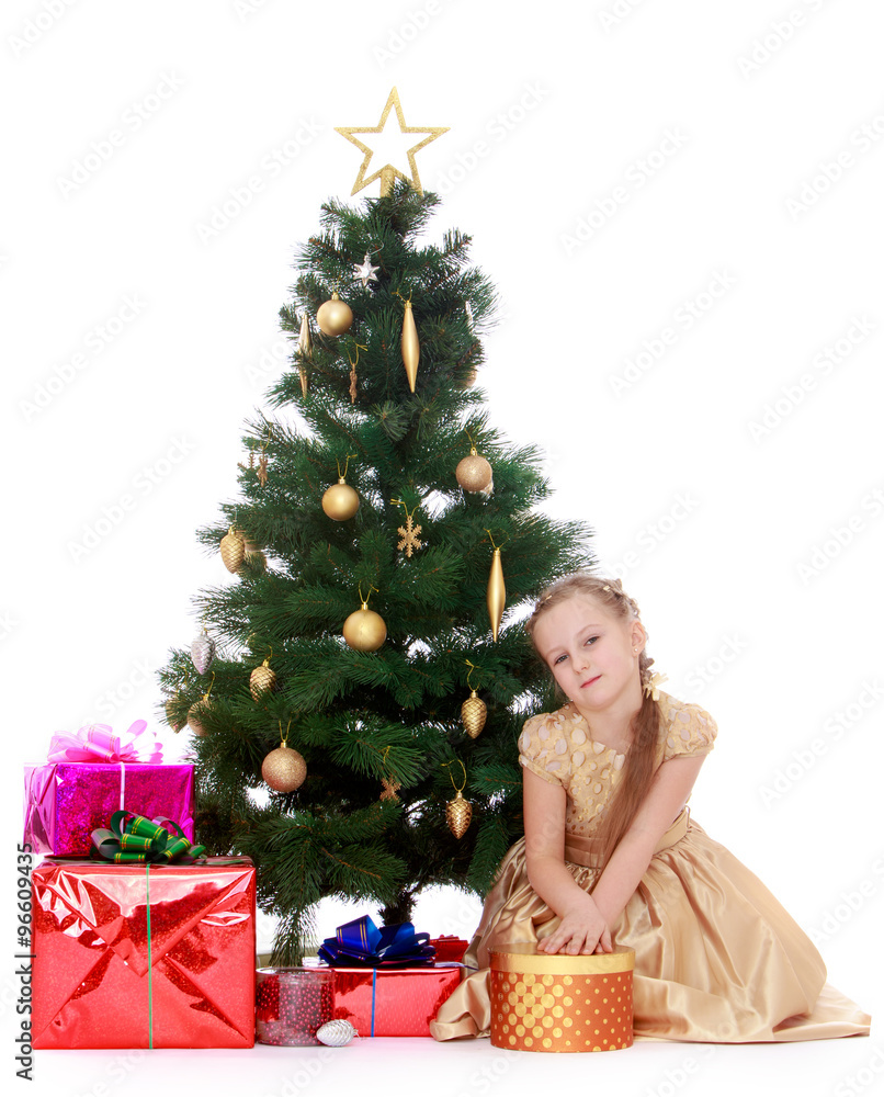 elegant girl near the Christmas tree elegant girl near the Christmas tree