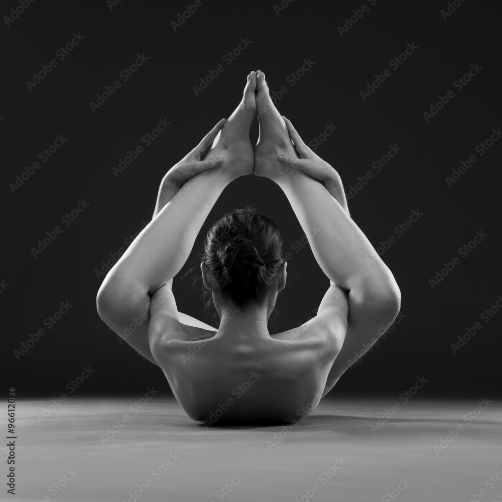 Naked yoga. Beautiful sexy body of young woman on gray background Stock  Photo | Adobe Stock