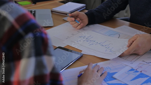 business people team work group during conference discussing financial diagram