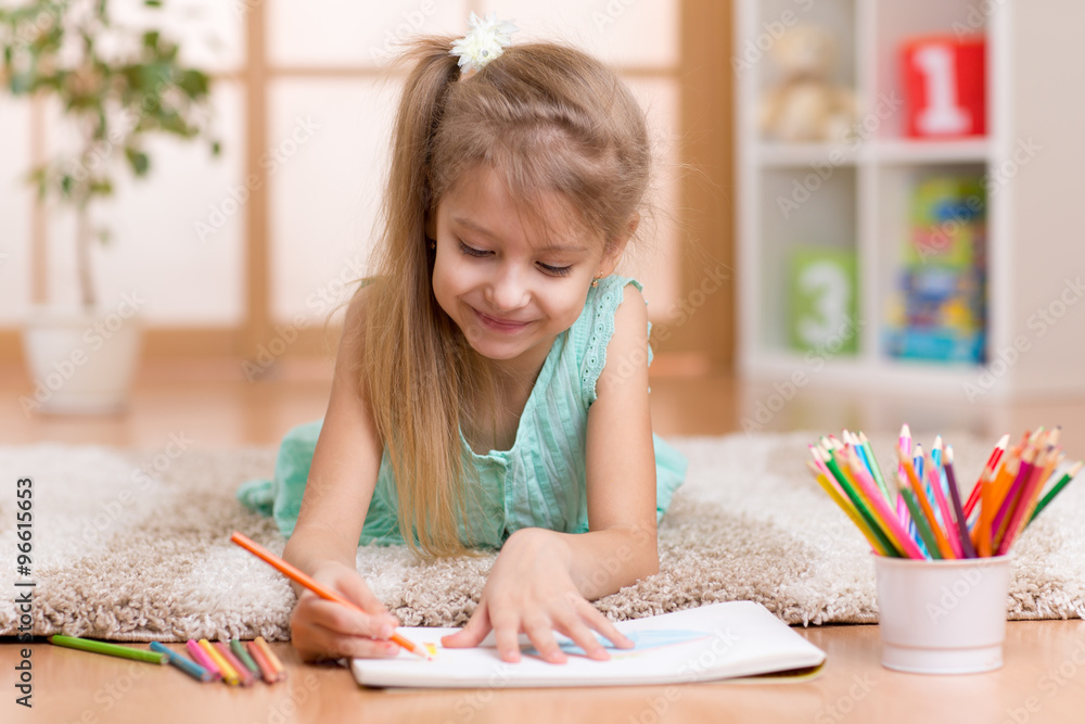 Child little girl child kid drawing at home Child little girl child kid drawing at home