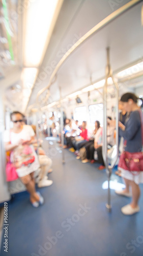 Blurred photo of passengers in sky train