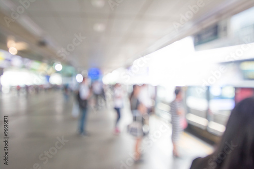 Blurred photo of passengers on sky train station