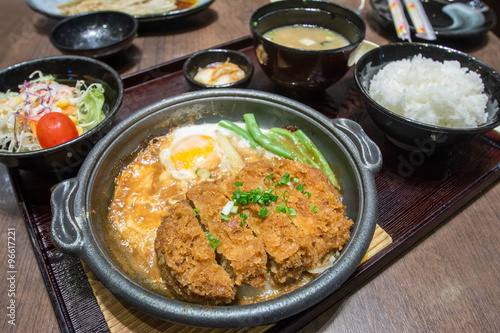 Deep Fired pork boiled  with fresh egg top on the rice bowl. basic Japanese food