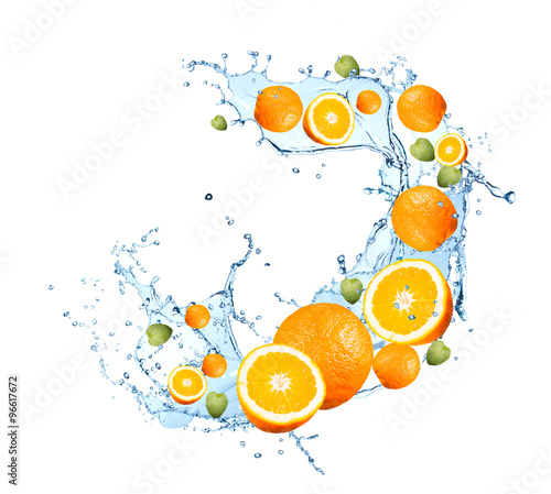 Fresh fruits, orange falling in water splash, isolated on white background