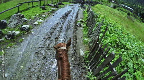 Astride on horse photo